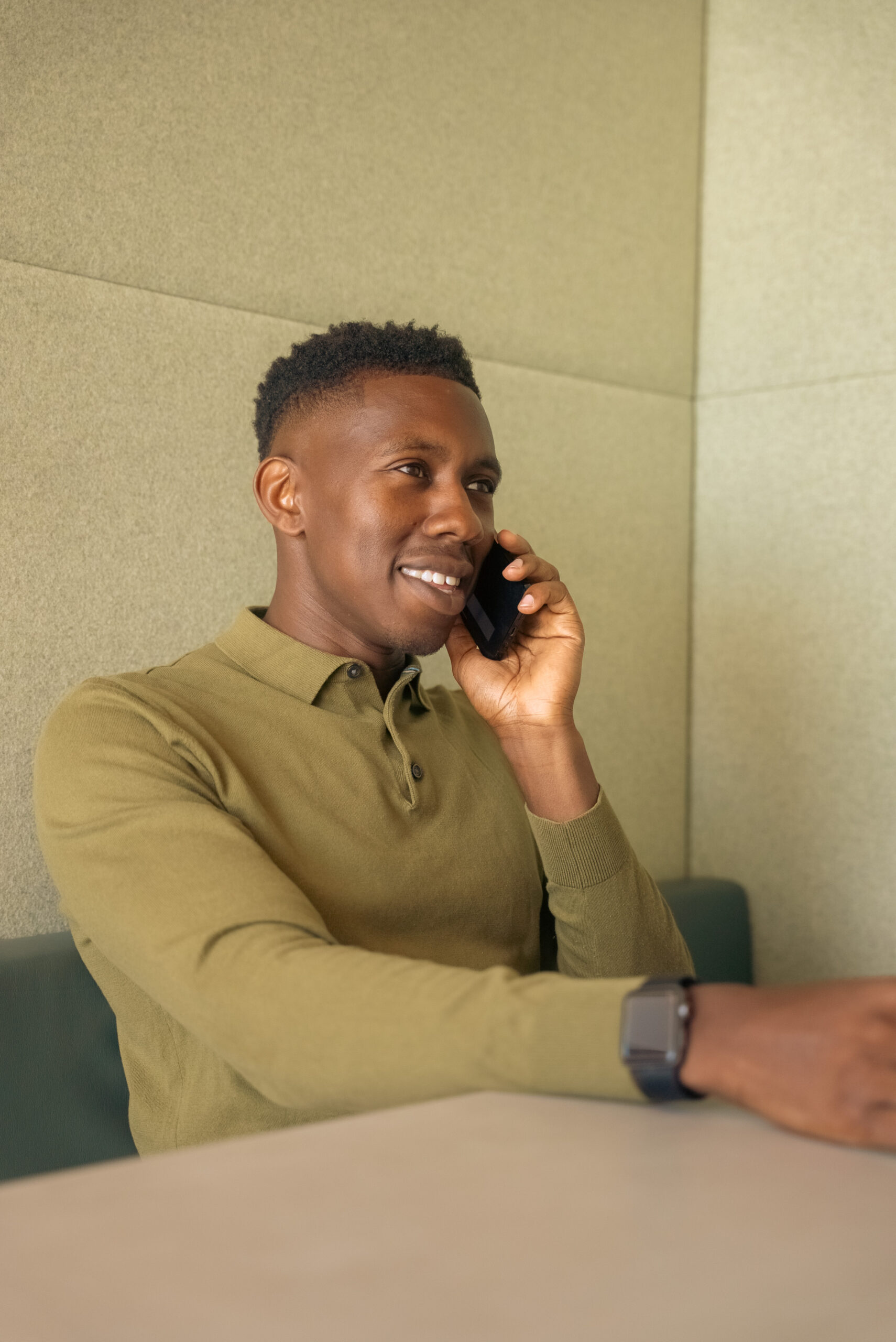 Head Coach on the phone